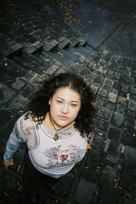 Odette standing under the camera with blue stone flooring